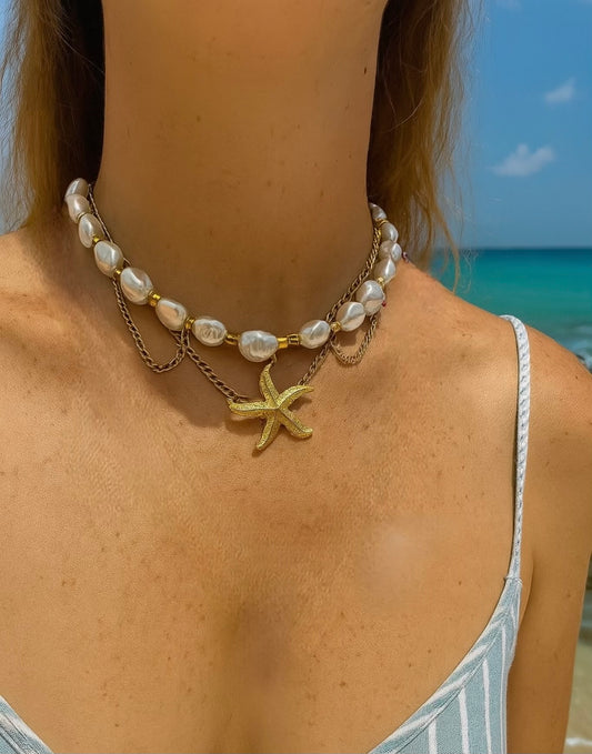 Pearl necklace with a starfish charm