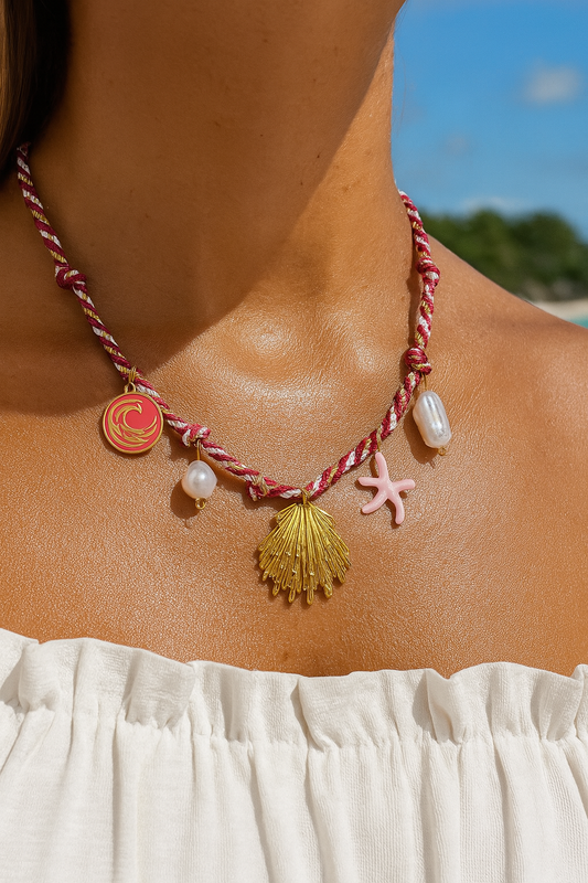 Rope necklace with playful charms and lustrous pearls