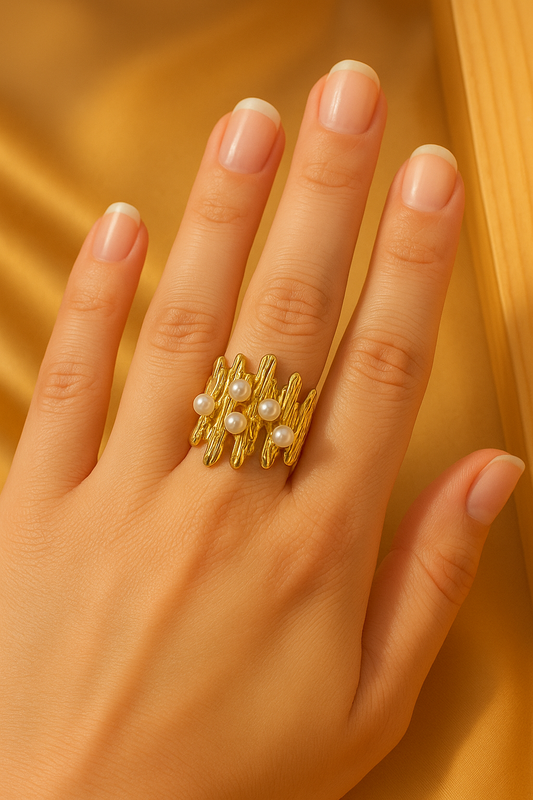 Stainless steel ring with pearls